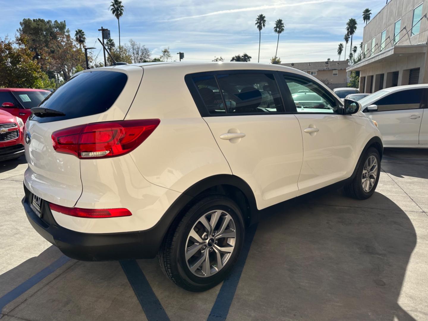 2015 WHITE /Black Kia Sportage (KNDPB3AC5F7) , located at 30 S. Berkeley Avenue, Pasadena, CA, 91107, (626) 248-7567, 34.145447, -118.109398 - rown City Motors is a used “Buy Here Pay Here” car dealer in Pasadena CA. “Buy Here Pay Here” financing, means that when you purchase your vehicle from our dealership, that you make the payments to the dealership as well. We do not need the banks approval to get you approved for a used auto - Photo#6